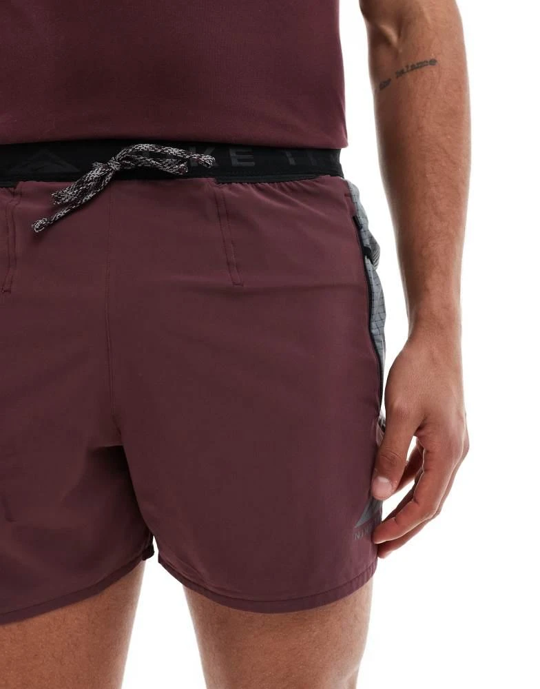 NIKE Nike Running Trail logo 5 inch shorts in burgundy 5