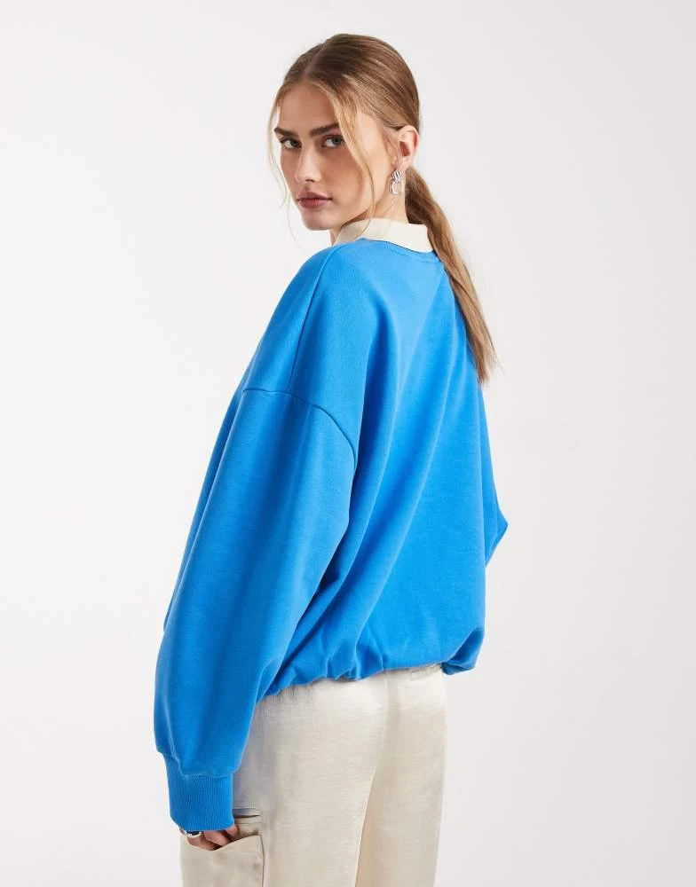 ASOS ASOS DESIGN heavy weight balloon hem sweat with polo collar in blue 2