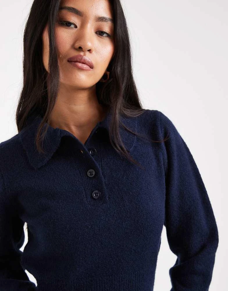 ASOS ASOS DESIGN knitted nipped waist long sleeve polo top in navy