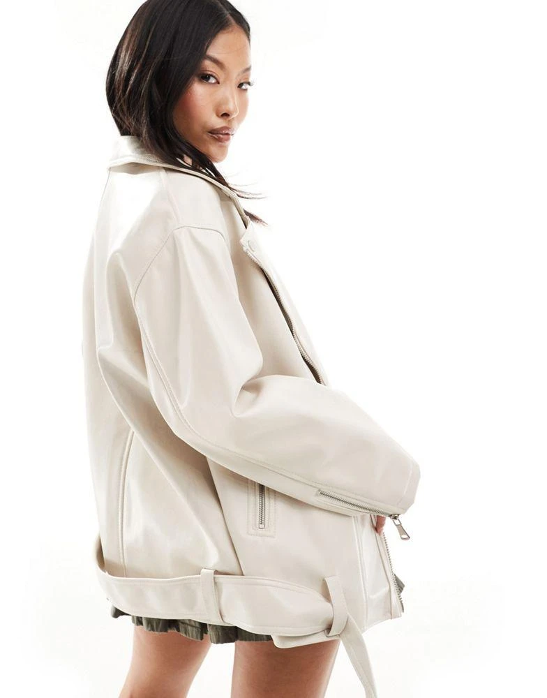 ASOS ASOS DESIGN Petite longline oversized faux leather biker jacket in white 2
