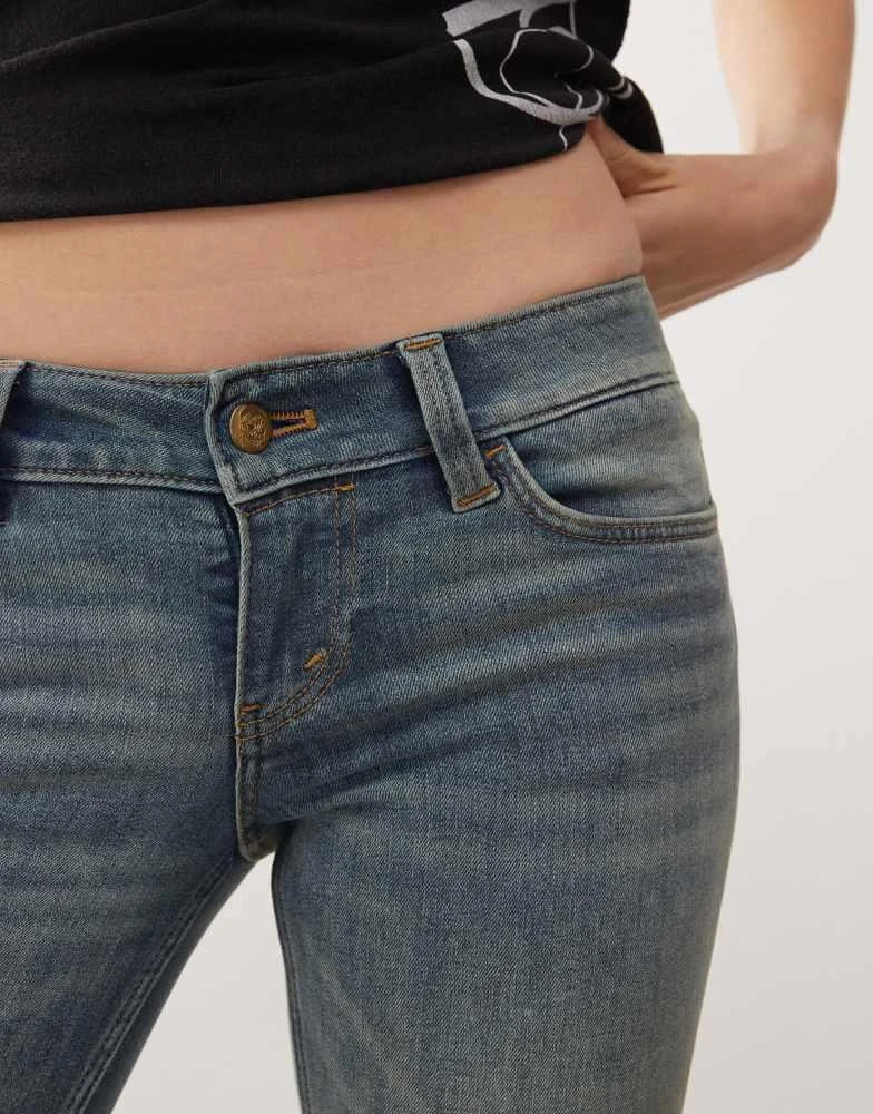 Cheap Monday Cheap Monday Booty Bei stretch low rise bootcut jeans in puddly blue tinted wash 5
