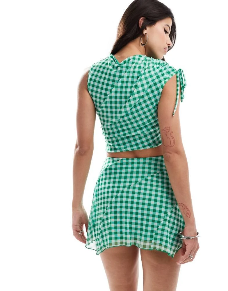 ASOS ASOS DESIGN co-ord seam detail flippy mini skirt in green gingham 5