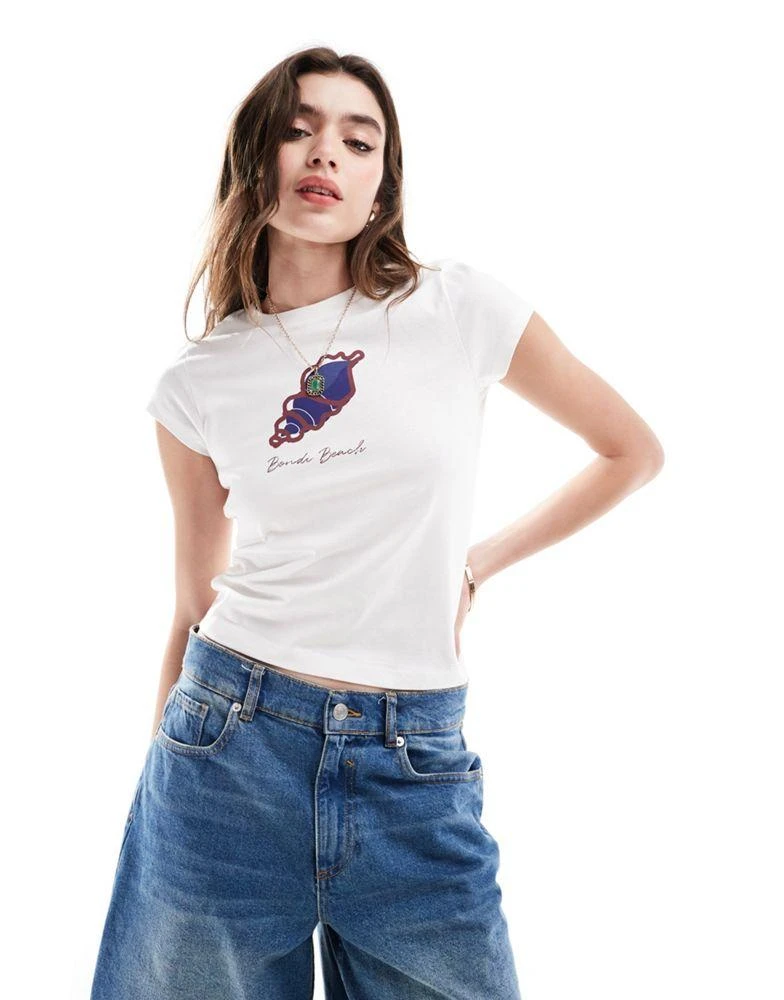 ASOS ASOS DESIGN baby tee with bondi beach shell graphic in cream 2
