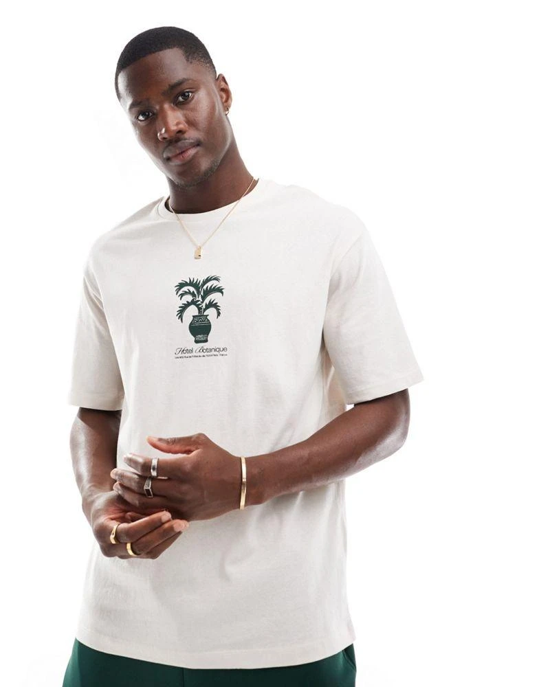 Selected Homme Selected Homme oversized t-shirt with central plant print in cream 1