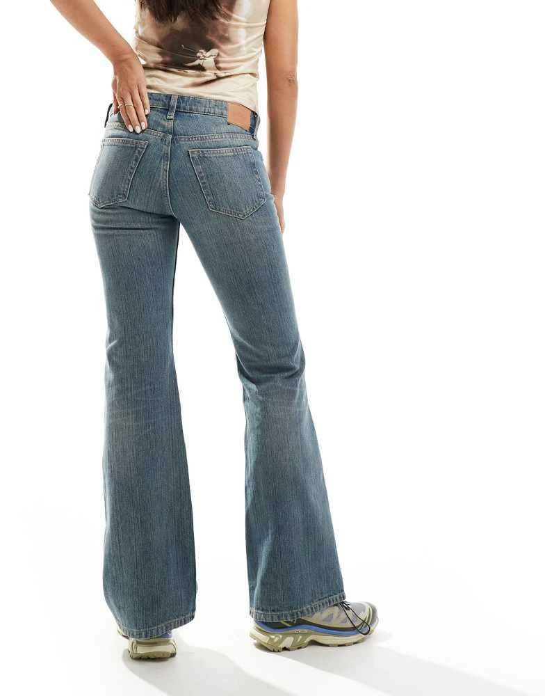 Weekday Weekday Nova low waist slim bootcut jeans in streaky blue wash 2