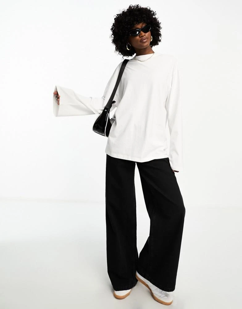 Weekday Weekday oversized long sleeve top in white 4