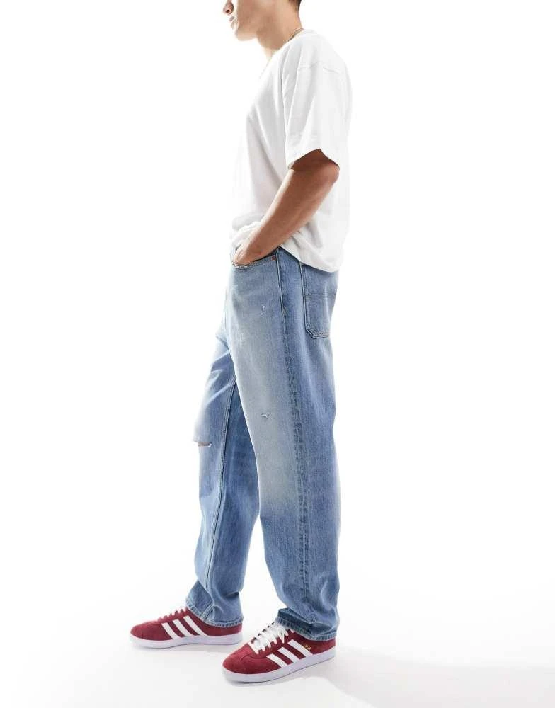 Tommy Jeans Tommy Jeans Skater ripped jeans in mid wash with flag details 3