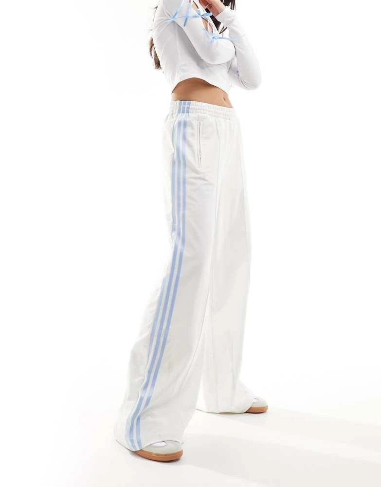 Adidas adidas Originals three stripe track pants in off white and blue 5