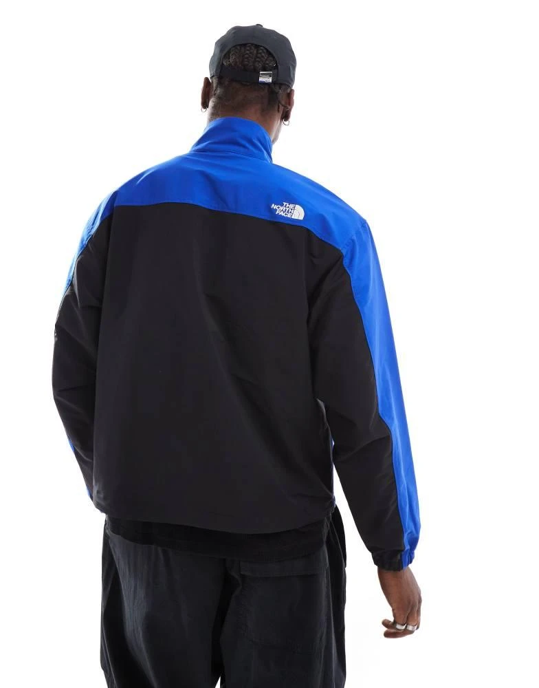 The North Face The North Face Easy Wind zip colourblock jacket in blue 2