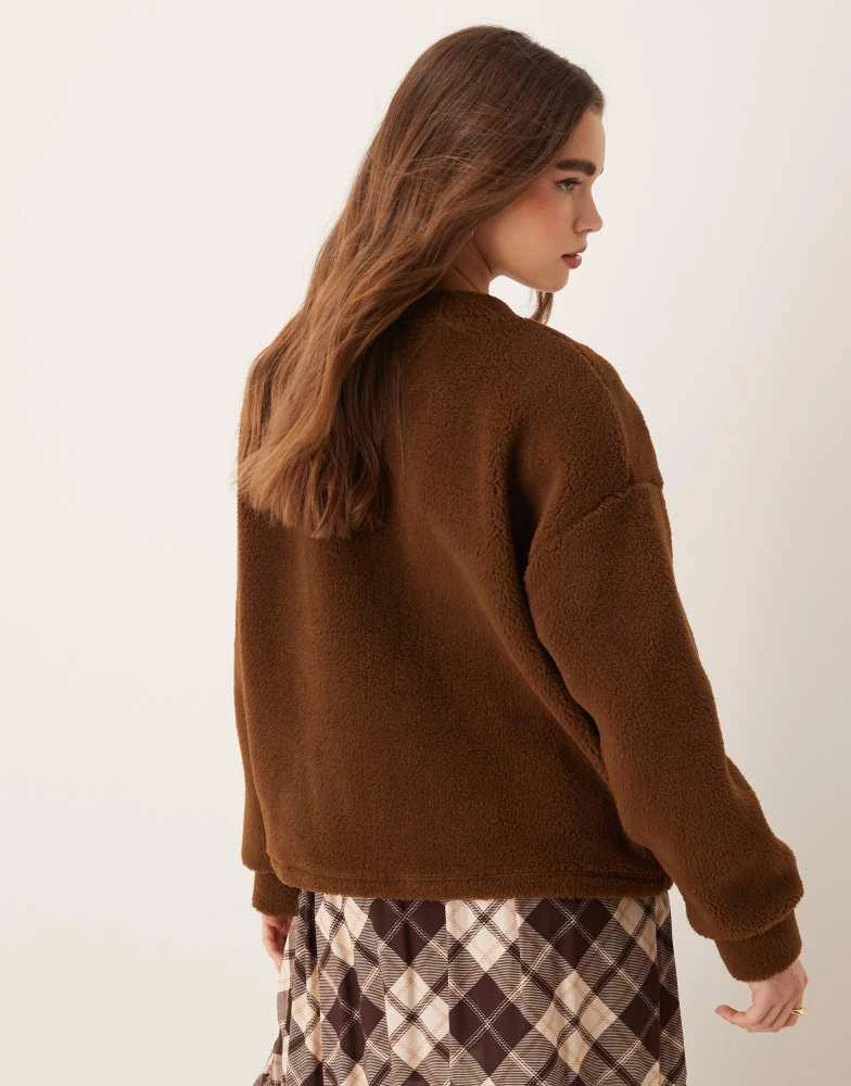 ASOS ASOS DESIGN Yosemite embroidered borg sweatshirt in brown 2