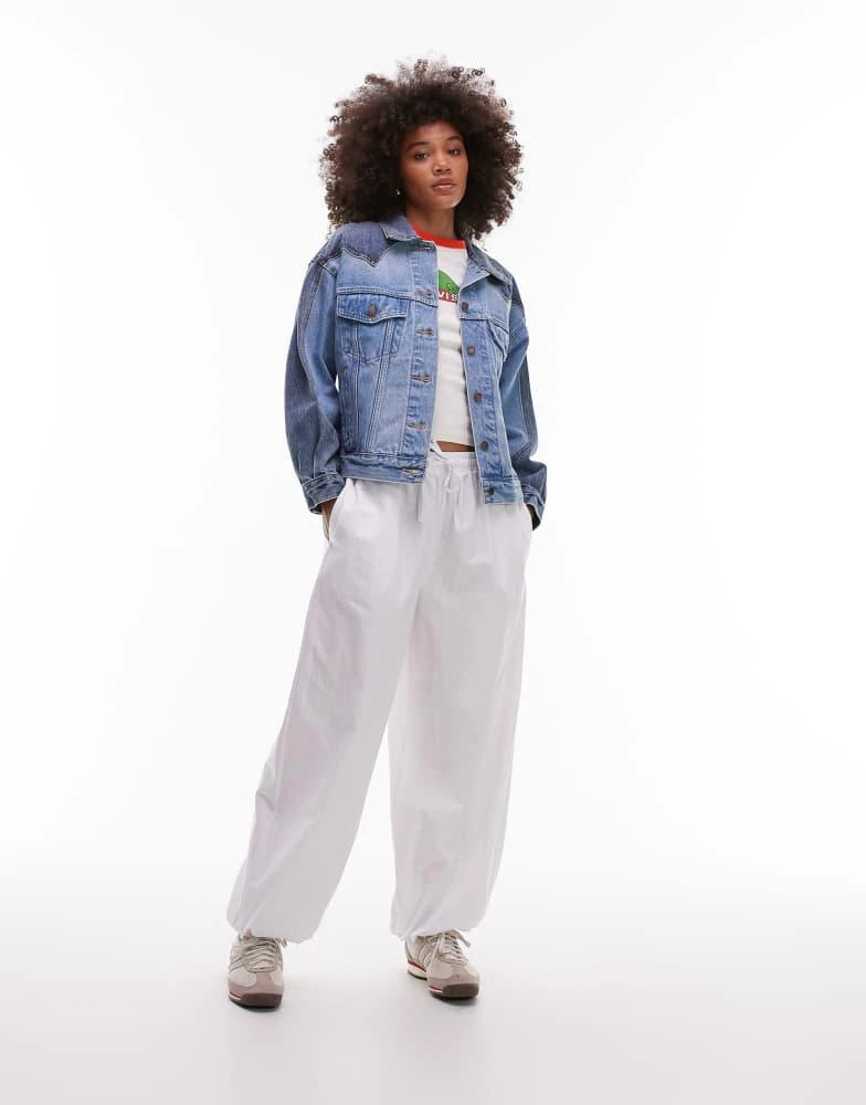 Levi
s Levi
s 90
s western pieced denim trucker jacket in blue 3