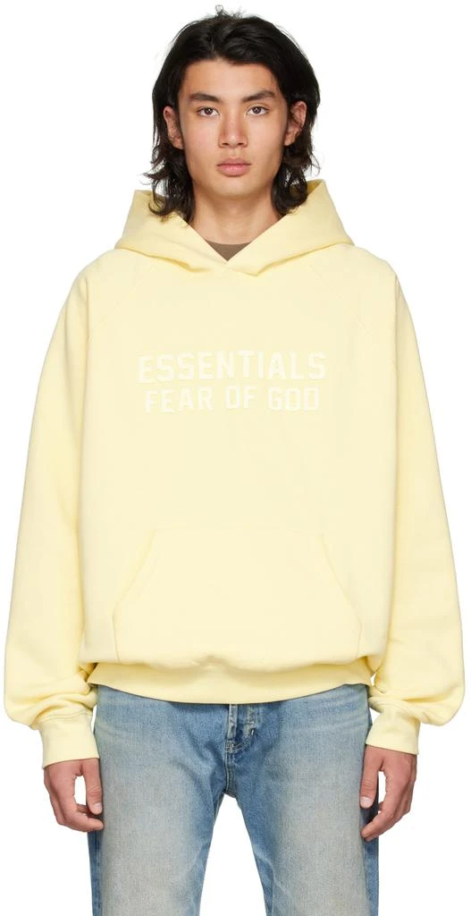 Fear of God ESSENTIALS Yellow Raglan Hoodie 1