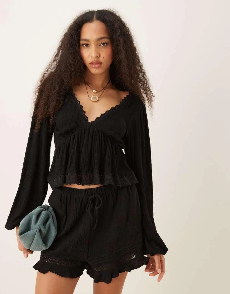 ASOS ASOS DESIGN crinkle tie back balloon sleeve top with lace trim in black - BLACK 1
