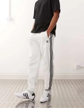 adidas Originals Firebird track pants in white and black