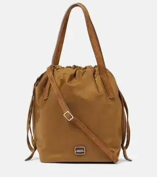 Khaite | Rory Medium leather-trimmed bucket bag