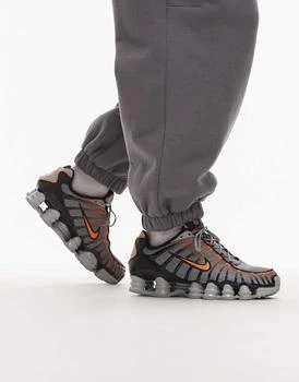 Nike Shox TL trainers in grey and orange