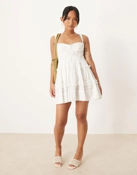 Lace & Beads Petite lace trim corset ruffle mini dress in white
