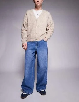 ASOS DESIGN super baggy jeans with back print in mid wash blue