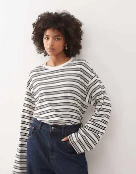Monki oversized long sleeve t-shirt with side slits in black and white stripe