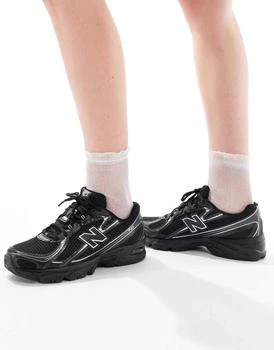 New Balance 740 trainers in black and silver metallic
